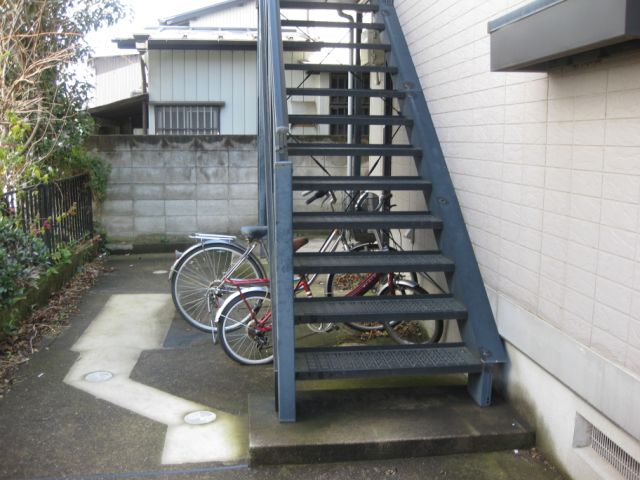 Other room space. Shared stairs.