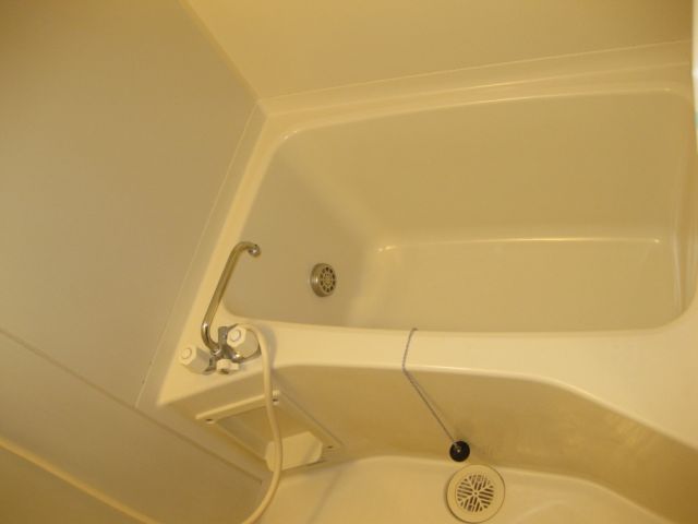 Bath. It is reheating hot water supply. It saves water bill.