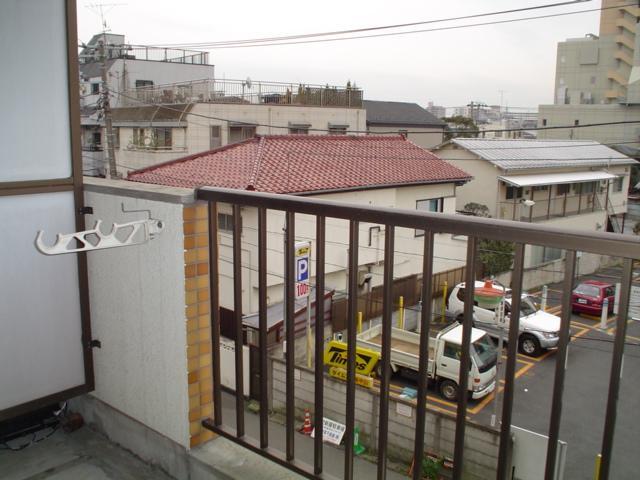 Balcony. Is the view from the veranda. Front parking lot