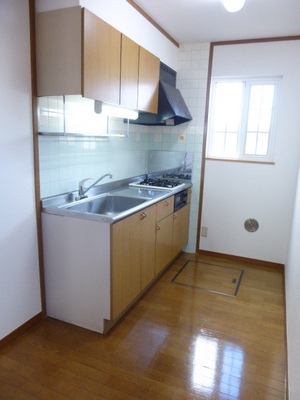 Kitchen. It is a photograph of another room of the same type