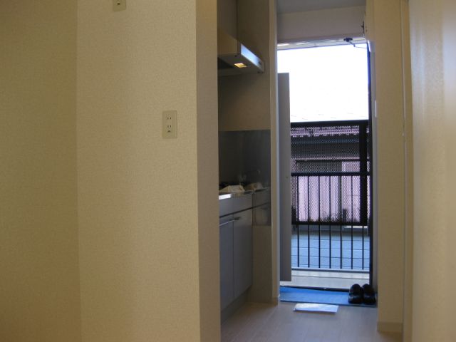 Other room space. It is around the kitchen