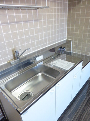 Kitchen. Washing is a breeze with wide sink