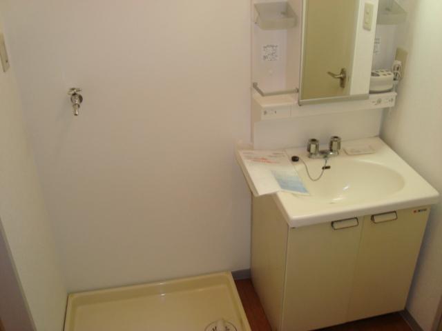 Washroom. Also it comes with a separate wash basin ~