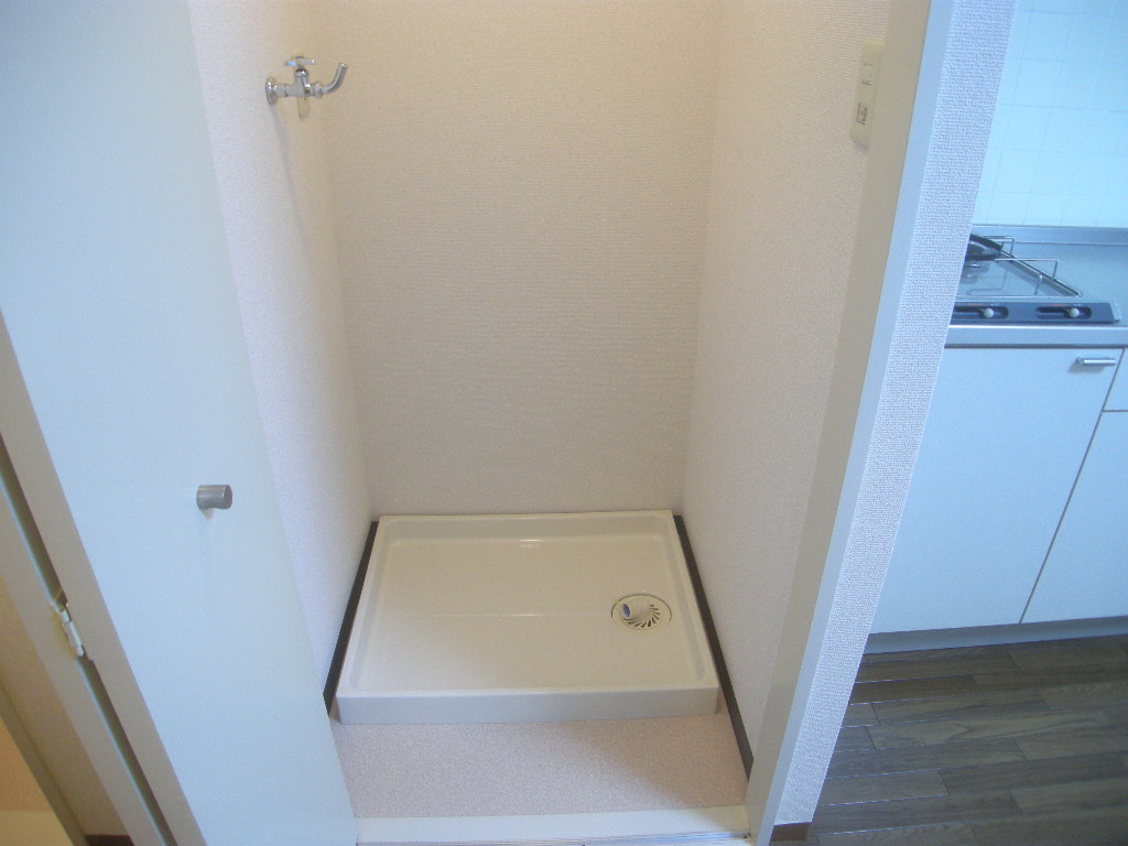 Other Equipment. Washing machine storage is equipped with door