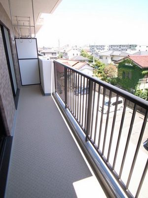 Balcony. It is futon also room in the spacious balcony