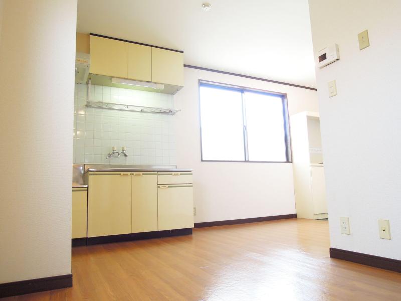 Living and room. The dining space and large windows.