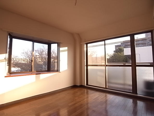 Living and room. This room has a feeling of opening with a large bay window.