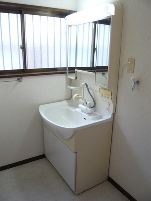 Washroom. Convenient shampoo dresser in the morning getting ready to bright wash room have windows