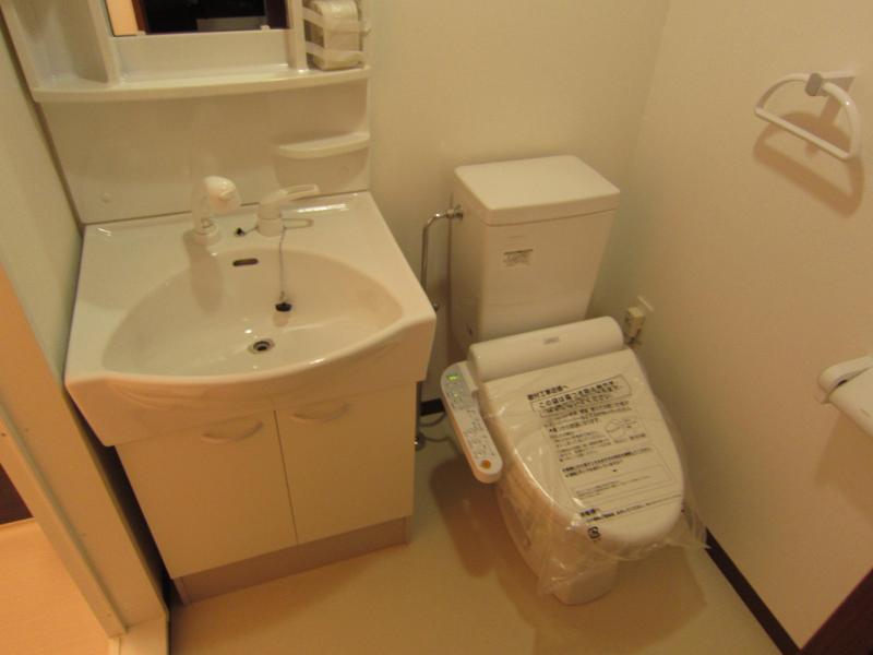 Washroom. The photograph is an image photograph of the same type type