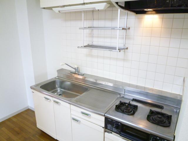 Kitchen. Gas stove 2-neck system Kitchen. Refrigerator storage is next to