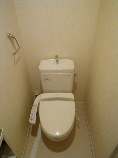 Toilet. It is with warm water washing machine. 