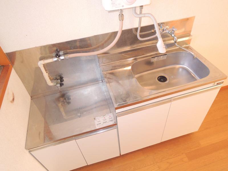 Kitchen. Two-burner stove is installed Allowed wide kitchen.