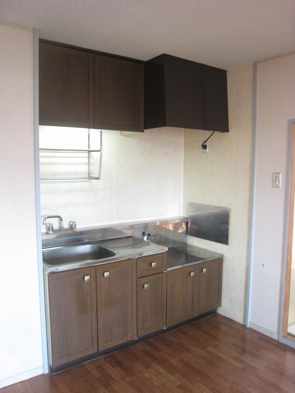 Kitchen. Also spacious kitchen.