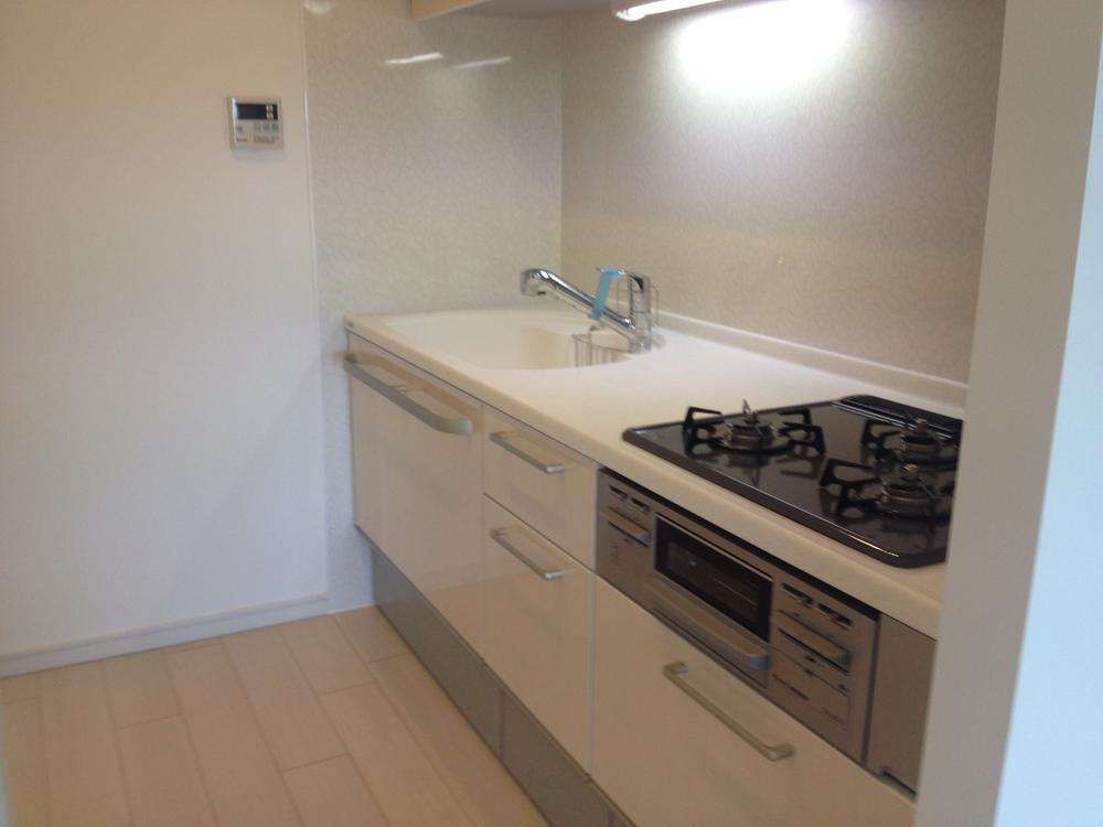 Kitchen. Artificial marble top panel specification of the kitchen is your easy-care design.