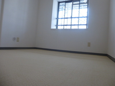 Living and room. It is bonded carpet