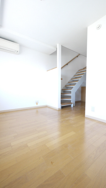 Living and room. An indoor stairs maisonette