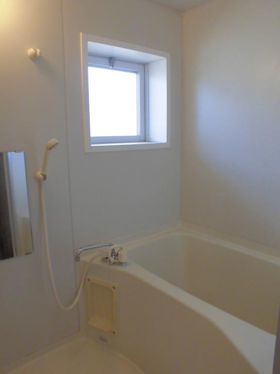 Bath. Small window with tub