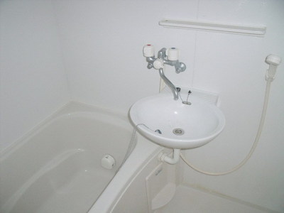 Bath. It is a wash basin with the bathroom