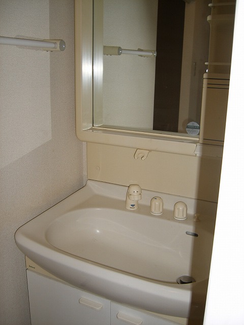 Washroom. With separate wash basin. 