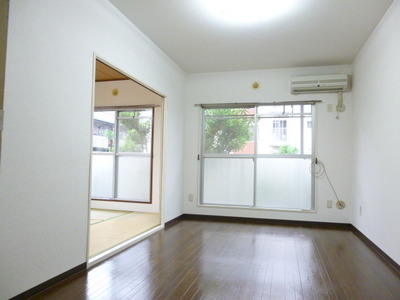 Living and room. Lighting good in the "living-dining facing the balcony" large windows