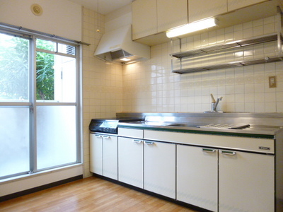 Kitchen. IH cooking heater with. There is also a balcony on the kitchen side