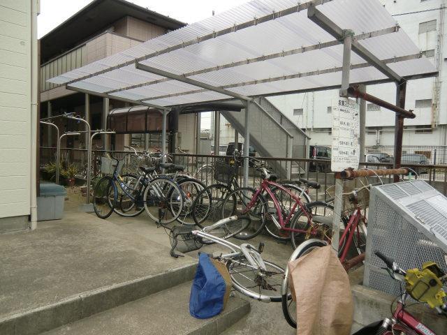 Other. Bicycle parking lot is equipped with roof