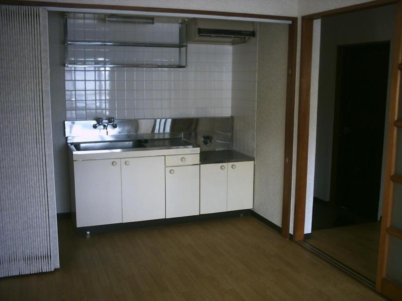 Kitchen. It is also a large kitchen space.