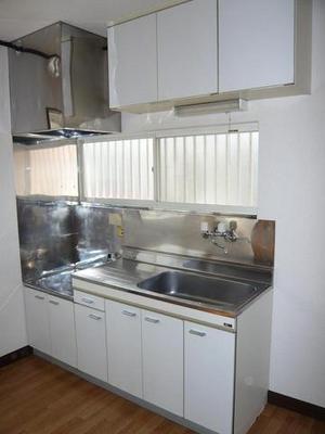 Kitchen. Two-burner gas stove Available! Bright kitchen space there is also a window! 