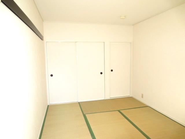 Living and room. Sliding door is also a bright rooms with white