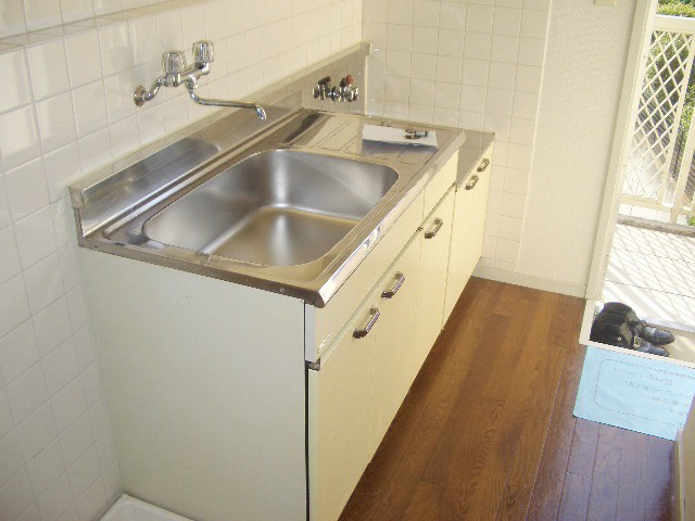 Kitchen. Happy is a gas stove can be installed.