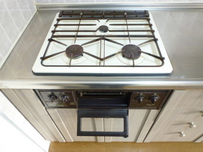 Kitchen. Typical indoor photo 3-neck drop-in kitchen with stove. 