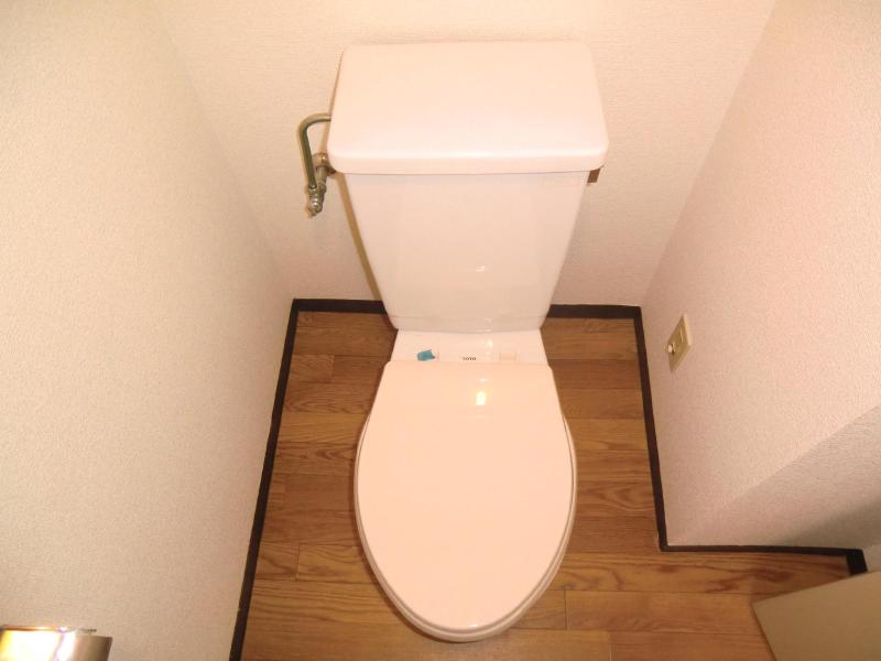 Toilet. With electrical outlet so bidet can with later