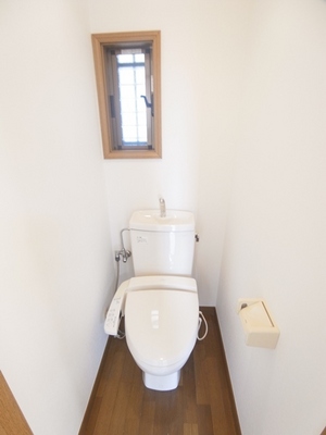 Toilet. Because there is a window, You can ventilation. Warm water cleaning toilet seat with.