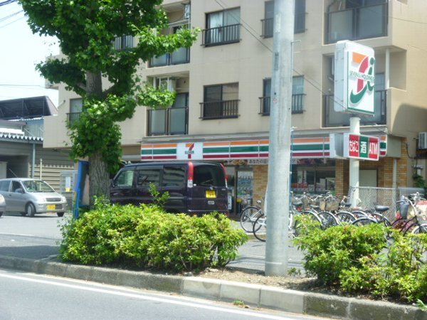 Convenience store. Seven-Eleven Funabashi market store up (convenience store) 116m