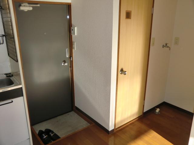 Entrance. It is also equipped with washing machine inside the room