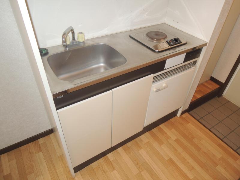 Kitchen. With bite of the stove. Mini fridge. 