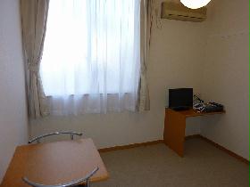 Living and room. tv set, Air conditioning, curtain, table, Chair equipped