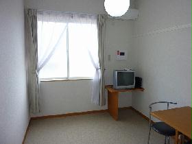 Living and room. TV, Air conditioning, curtain, table, Chair equipped