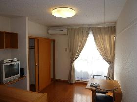 Living and room. tv set, Air conditioning, curtain, desk, Chair equipped