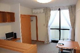 Living and room. TV, Air conditioning, curtain, table, Chair equipped