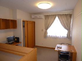 Living and room. tv set, Air conditioning, curtain, desk, Chair equipped