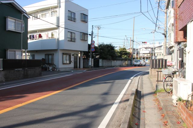 Other. The building is the road in front of.