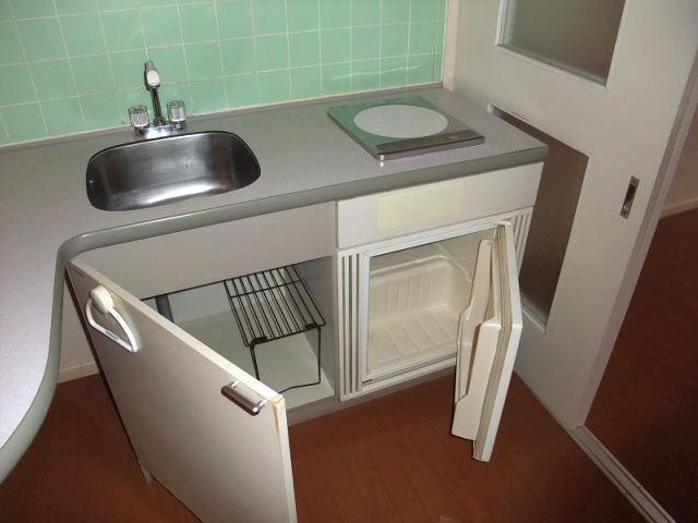 Kitchen. IH stove and with a mini fridge