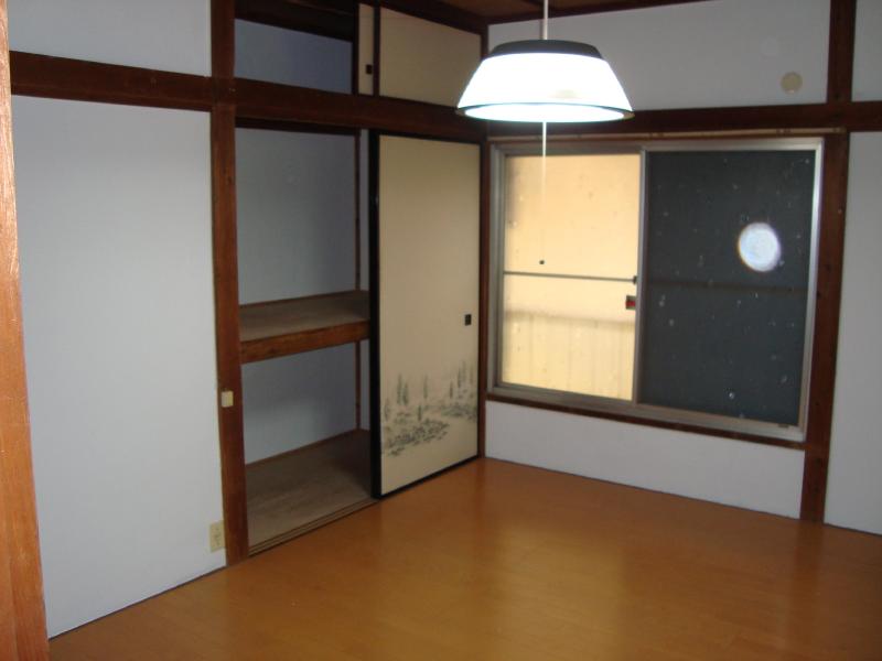 Living and room. It is a photograph at the time of Western-style, but looks like