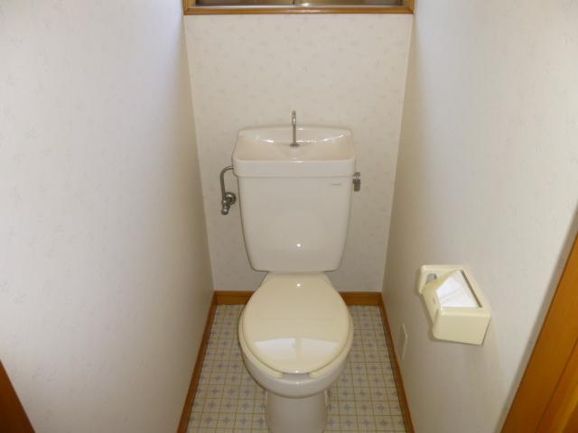 Toilet. Also with window