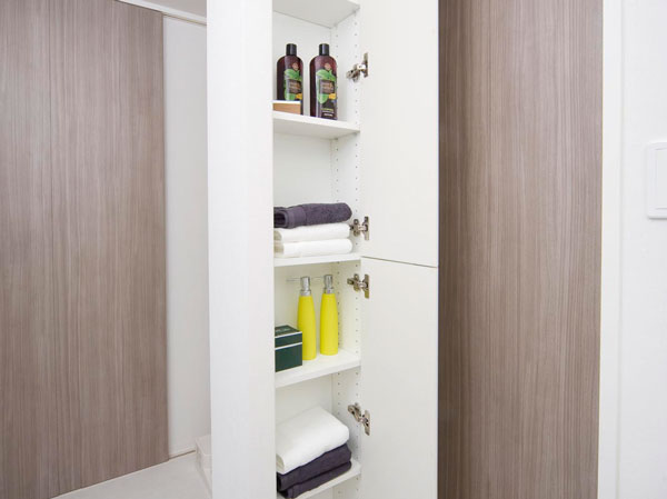 Bathing-wash room.  [Linen cabinet] Towel and change of clothes, Available in linen cabinet that can hold such as bath salts.