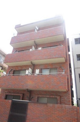 Building appearance. Red brick of reinforced concrete apartment. From the station is one main road.