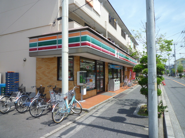 Convenience store. Seven-Eleven Tomihama store up (convenience store) 232m