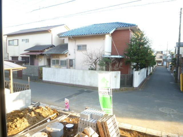 Local photos, including front road. 1 Building