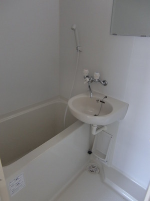 Washroom. Washbasin of the bath and integrated.